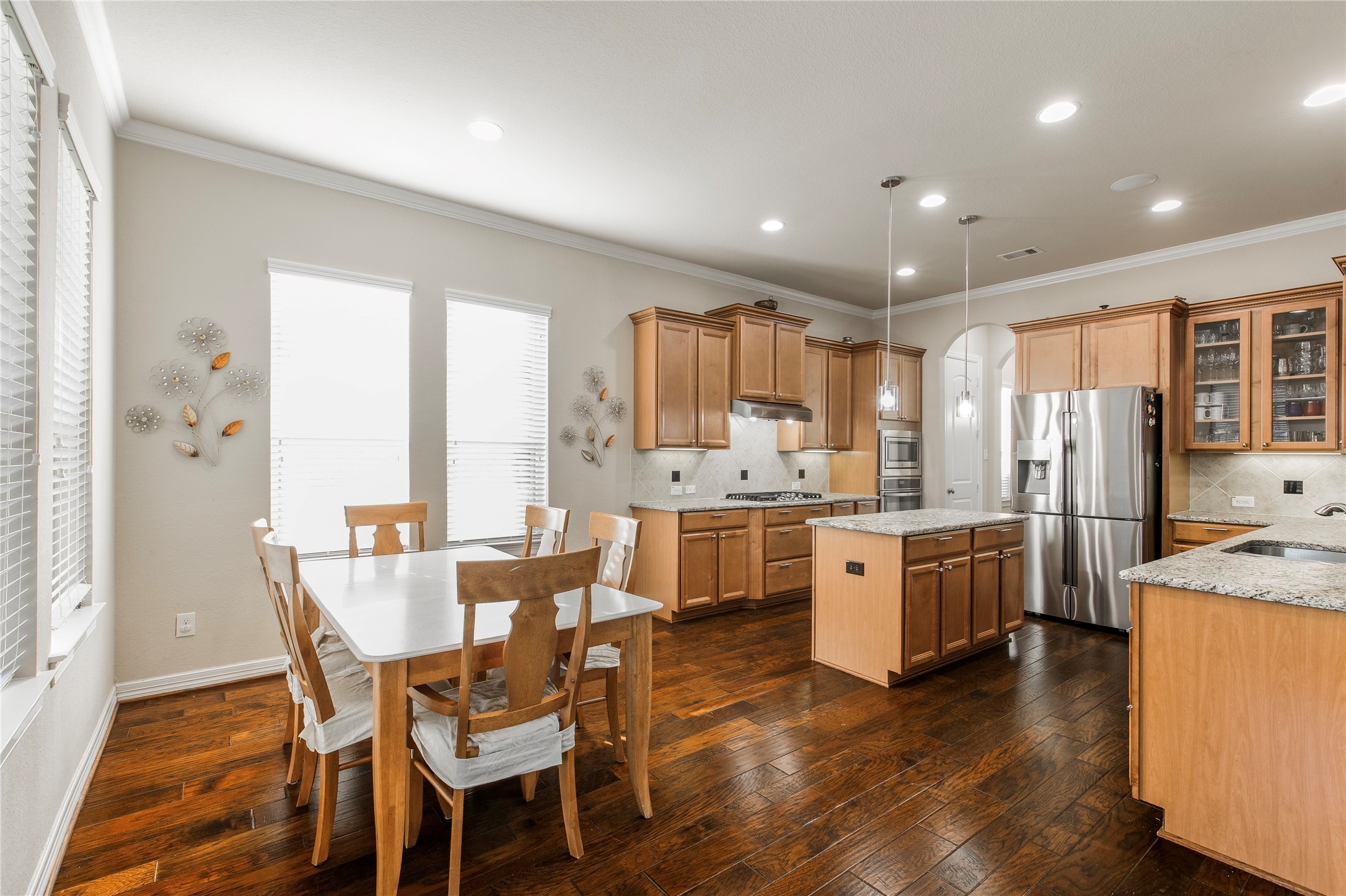 2607 Tree Swallow Bluff Path Spring, TX 77389 - Photo 15 of 50 a large kitchen with a table and chairs