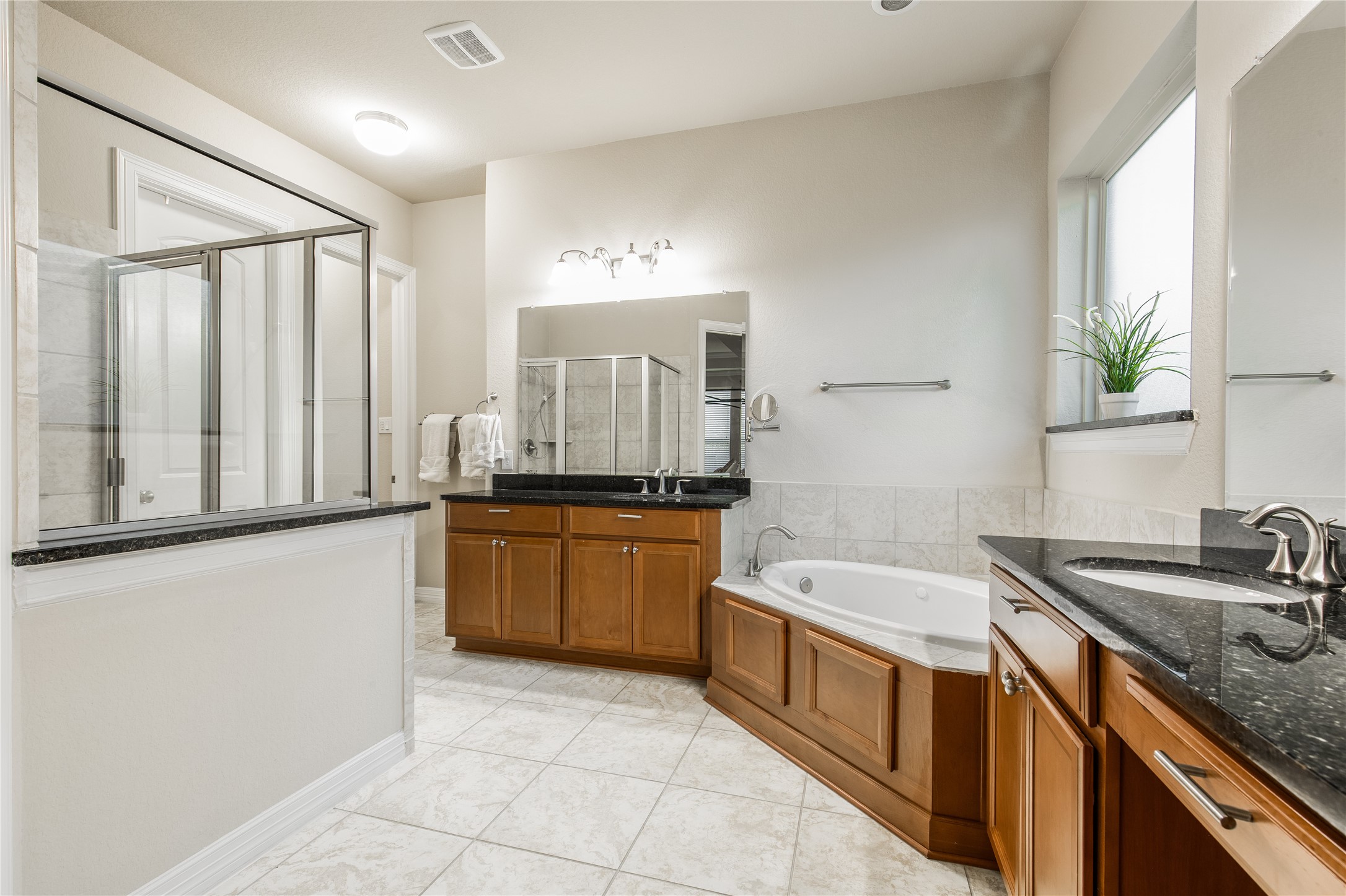 2607 Tree Swallow Bluff Path Spring, TX 77389 - Photo 20 of 50 a large kitchen with a sink and a large window