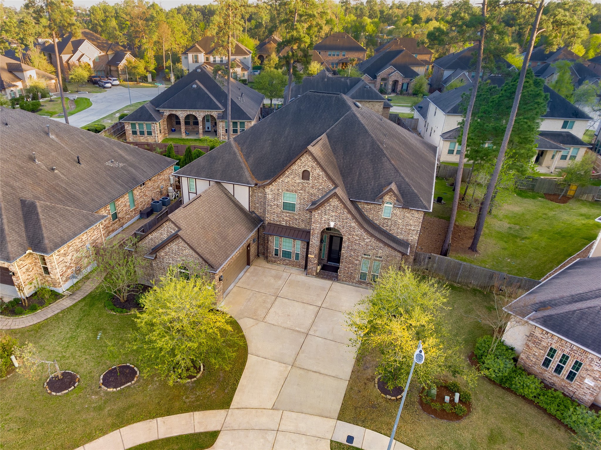 2607 Tree Swallow Bluff Path Spring, TX 77389 - Photo 2 of 50 an aerial view of a house with swimming pool and large trees