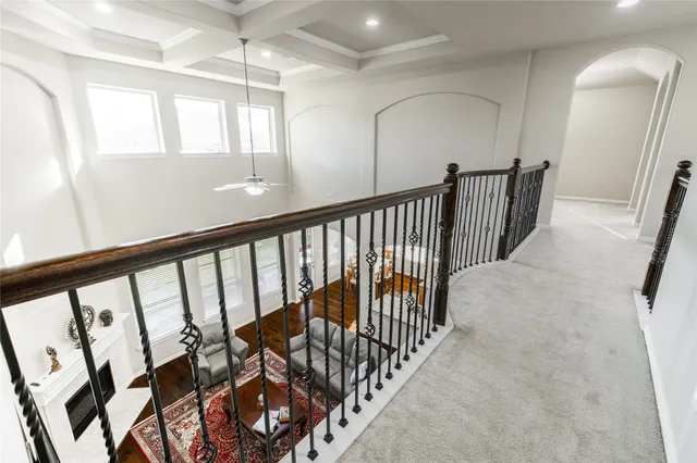 a view of staircase with lots of wooden floor
