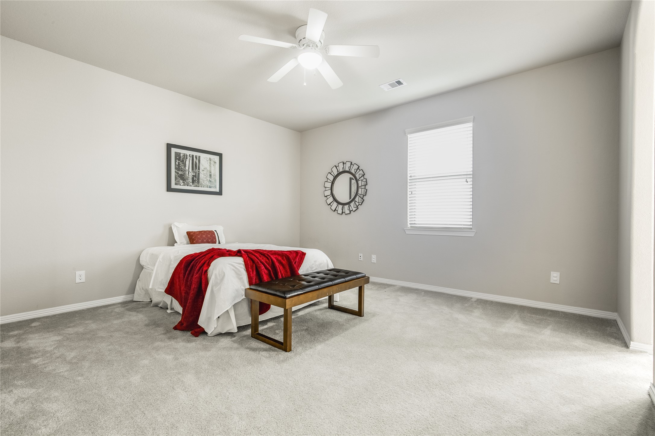 2607 Tree Swallow Bluff Path Spring, TX 77389 - Photo 31 of 50 a living room with a bed and a chandelier
