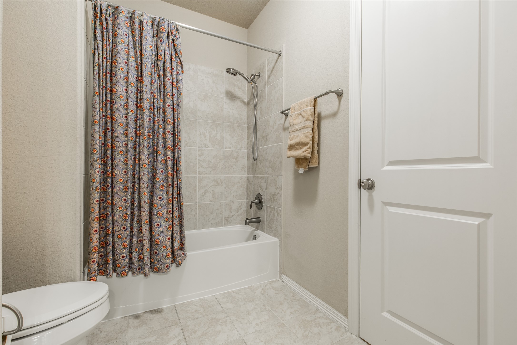 2607 Tree Swallow Bluff Path Spring, TX 77389 - Photo 35 of 50 a bathroom with a bathtub and a shower