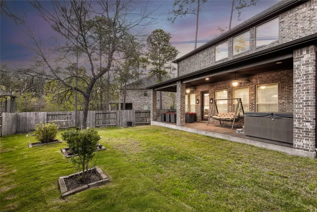 a view of living room with furniture and potted plant