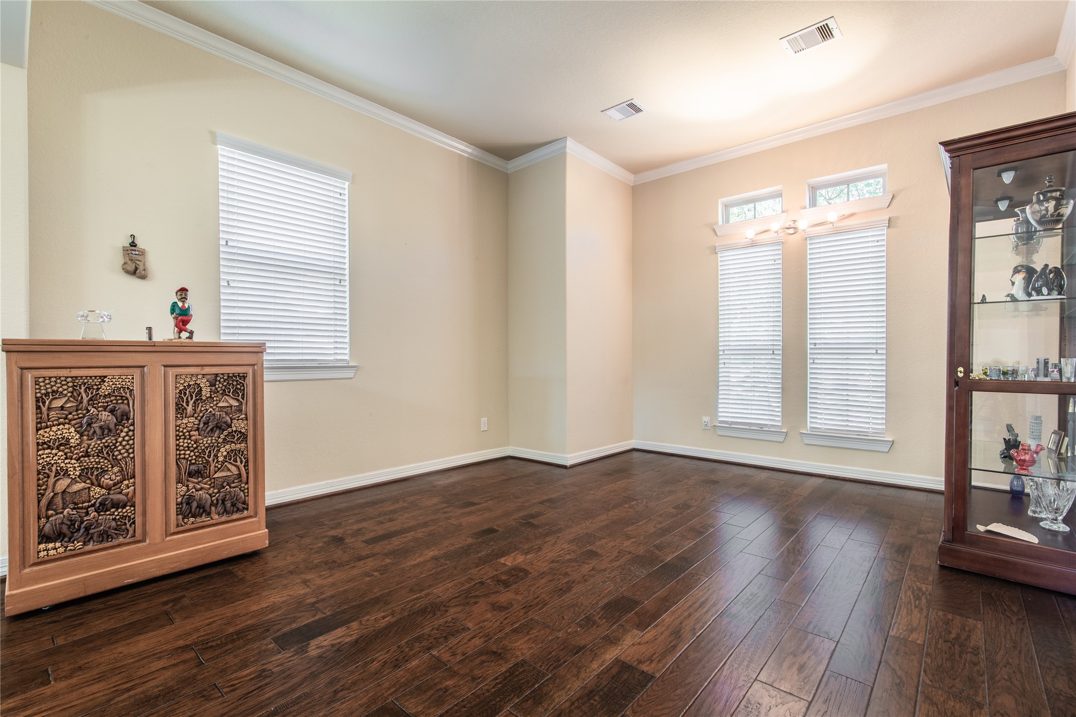 2607 Tree Swallow Bluff Path Spring, TX 77389 - Photo 5 of 50 wooden floor in an empty room with a window