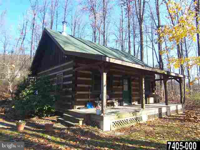 7728 Gnatstown Road Hanover, PA 17331 - Photo 1 of 25 a view of a house with backyard and sitting area