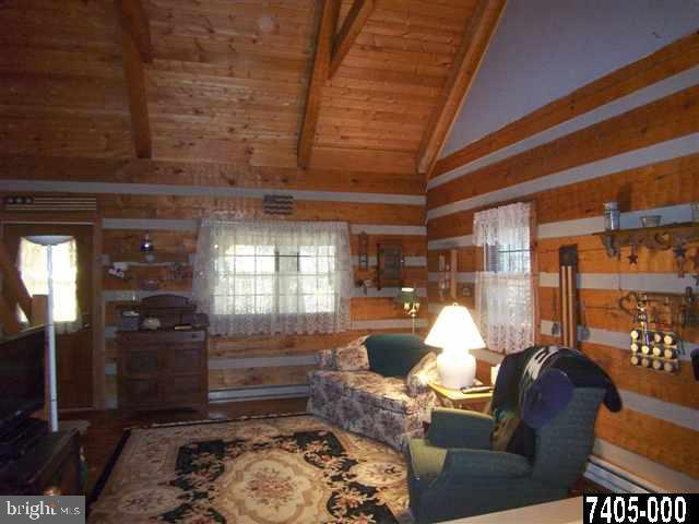 7728 Gnatstown Road Hanover, PA 17331 - Photo 16 of 25 a living room with furniture and a window