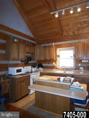7728 Gnatstown Road Hanover, PA 17331 - Photo 17 of 25 a kitchen with lots of counter top space and appliances