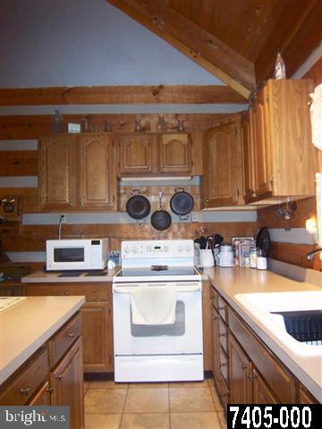 7728 Gnatstown Road Hanover, PA 17331 - Photo 19 of 25 a kitchen with a stove top oven