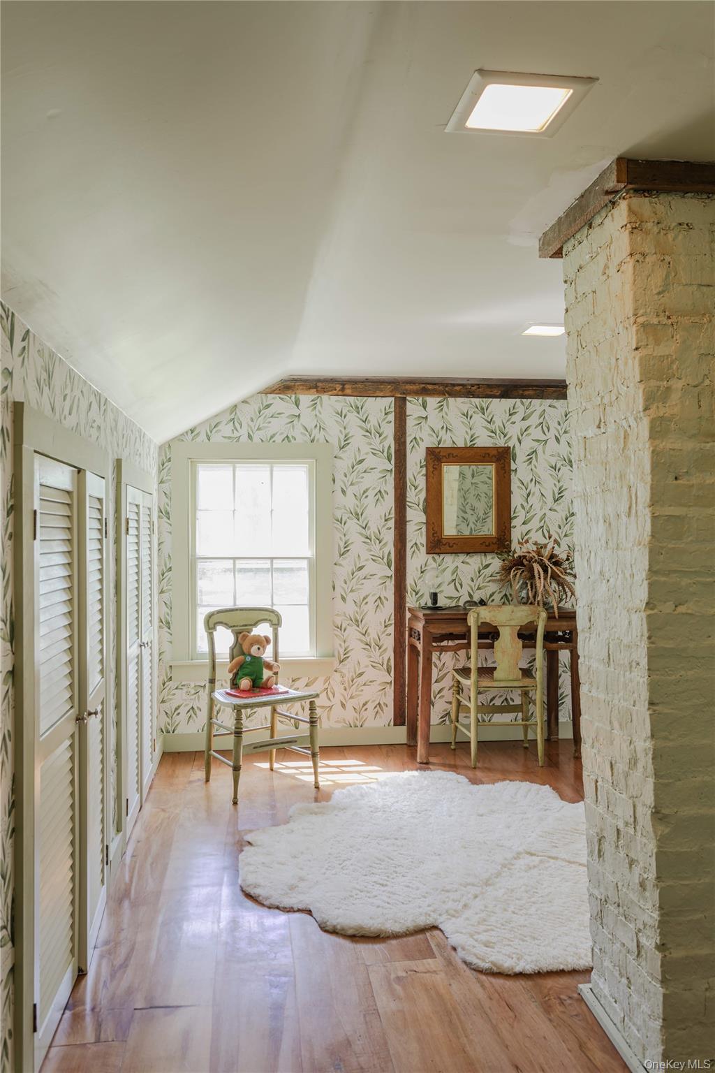 210 Middle Road Hudson, NY 12534 - Photo 35 of 42 Bedroom featuring wood-finish flooring, a pitched ceiling