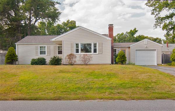 14 Colorado Street Springfield, MA 01118 - Photo 1 of 22 a front view of a house with a yard and trees