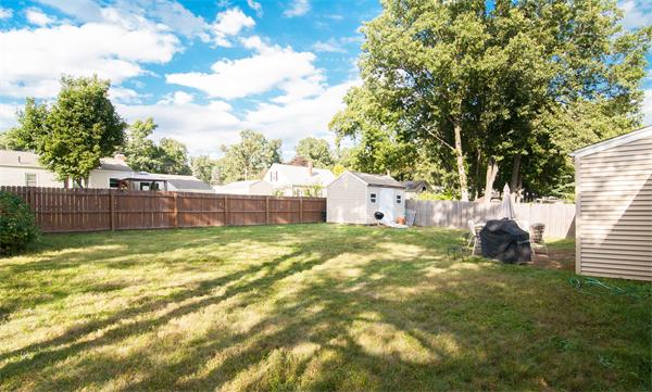 14 Colorado Street Springfield, MA 01118 - Photo 3 of 22 a view of a yard with a slide