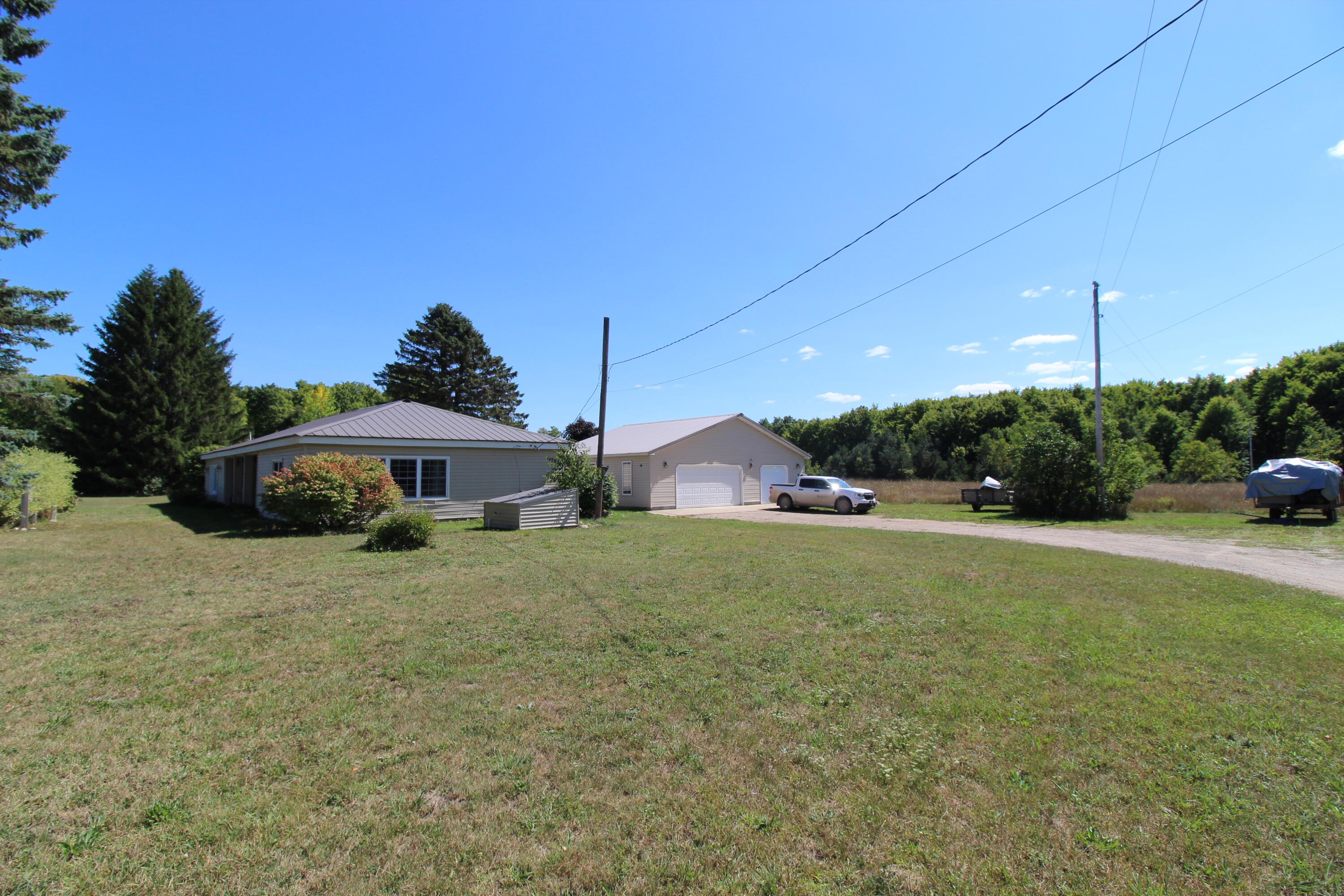 9795 Cameron Bridge Road Frederic, MI 49733 - Photo 1 of 40 Gallery Image 1