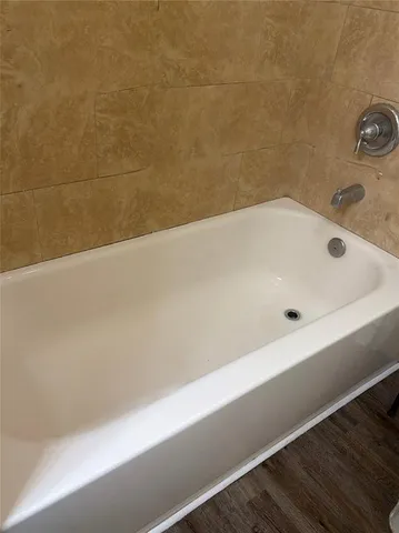 a bathroom with a bathtub