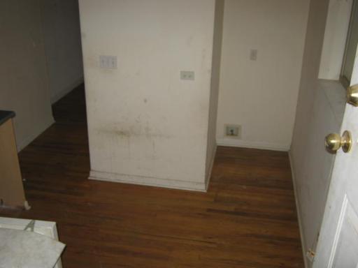 8142 South Drexel Avenue, Unit G Chicago, IL 60619 - Photo 9 of 11 wooden floor in an empty room