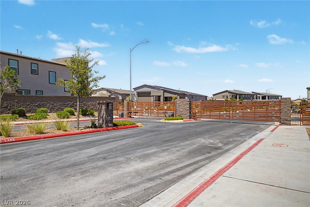 226 Augusta Ridge Henderson, NV 89015 - Photo 35 of 47 This property features a securely gated entrance, offering privacy and peace of mind.