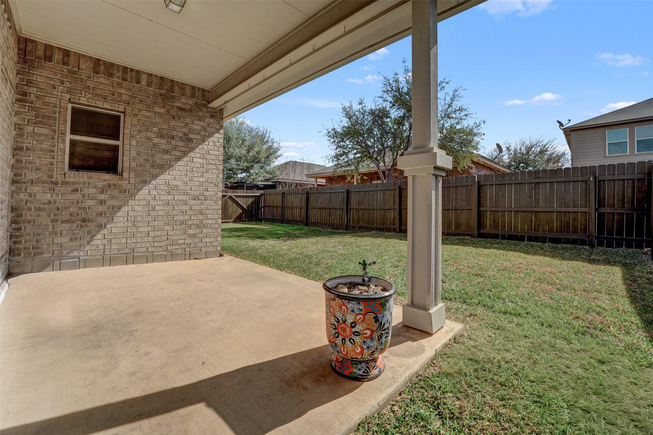 10506 Corvey Lane Helotes, TX 78023 - Photo 26 of 28 Fenced backyard with a patio area