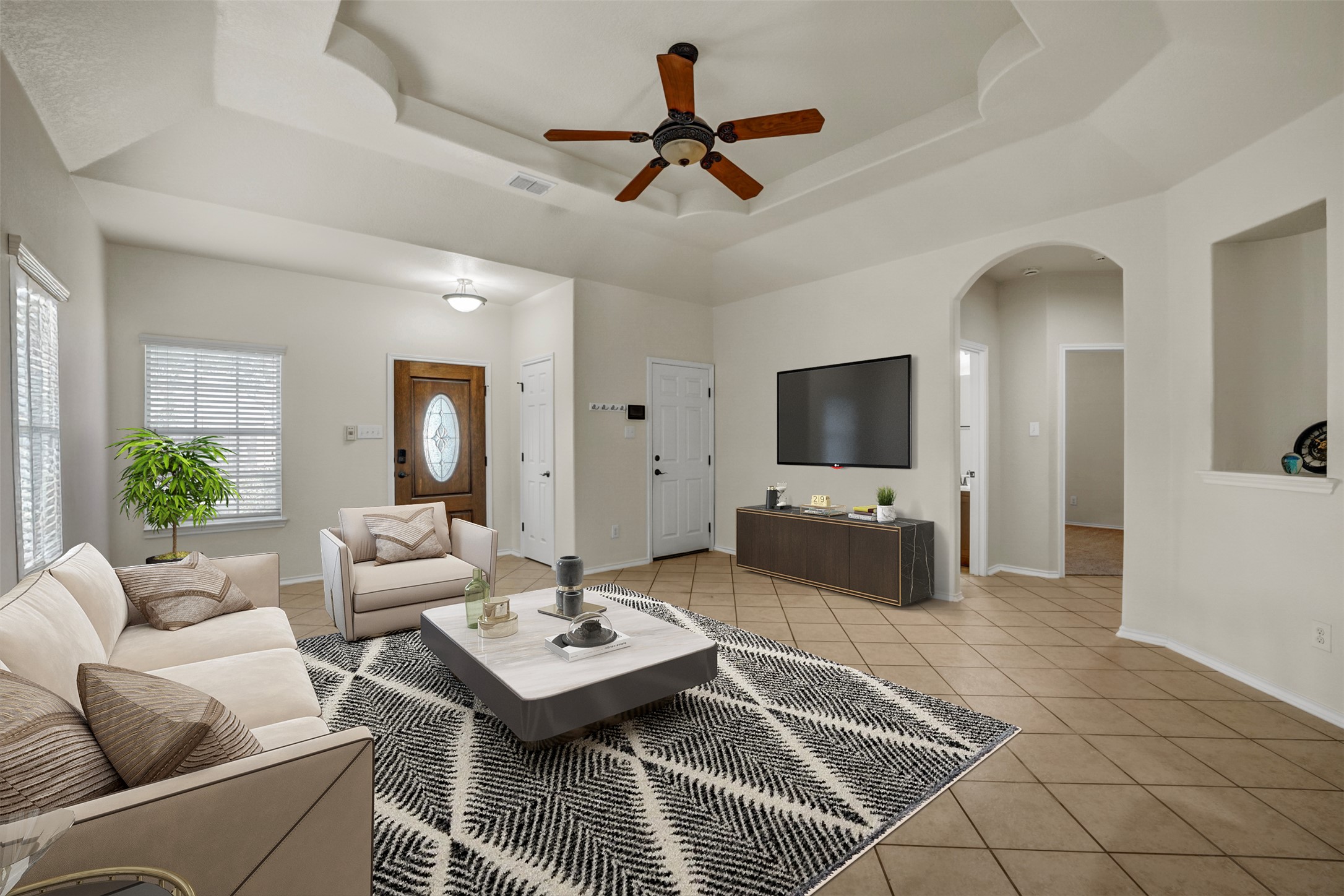 10506 Corvey Lane Helotes, TX 78023 - Photo 6 of 28 Living room with light tile patterned floors, ceiling fan, and arched walkways
"Virtually staged"