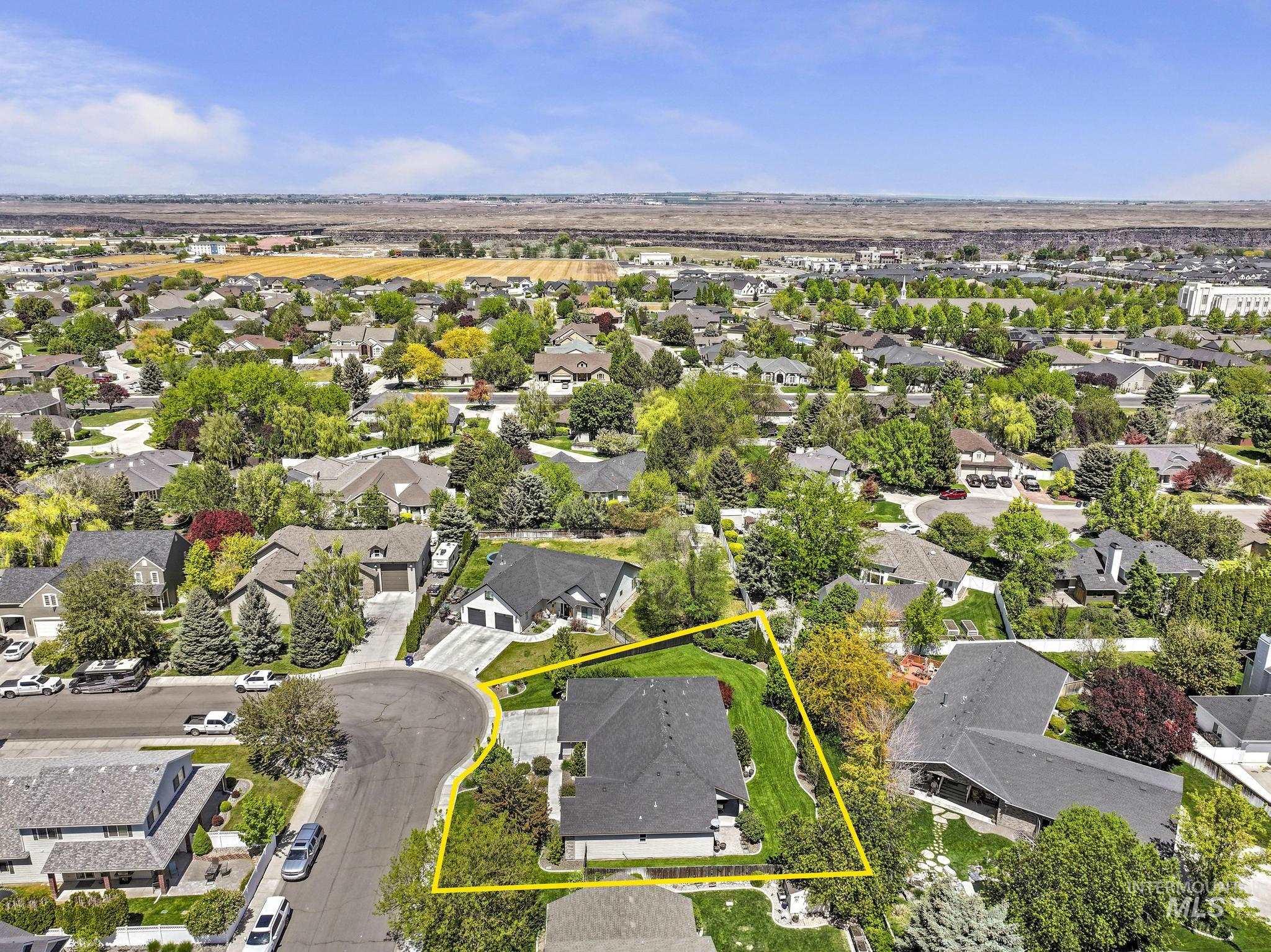 1937 Tamarack Loop Twin Falls, ID 83301 - Photo 49 of 50 Aerial perspective showcasing the property's expansive lot within a verdant neighborhood