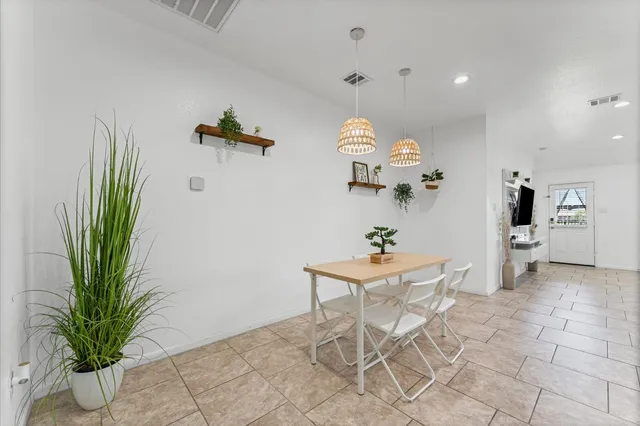 a view of a workspace with furniture