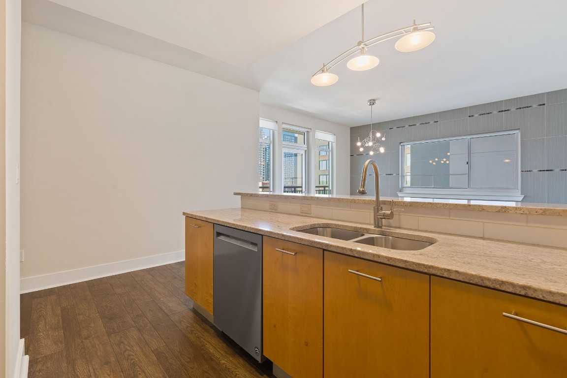 603 Davis Street, Unit 1304 Austin, TX 78701 - Photo 12 of 40 a bathroom with a sink and a mirror