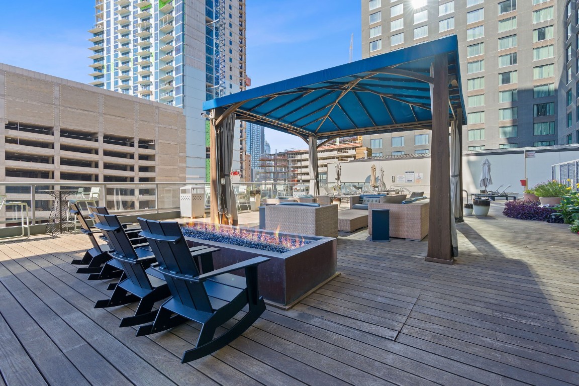 603 Davis Street, Unit 1304 Austin, TX 78701 - Photo 36 of 40 a view of a balcony with table and chairs