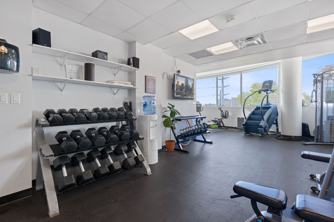 603 Davis Street, Unit 1304 Austin, TX 78701 - Photo 37 of 40 a living room with furniture and a window