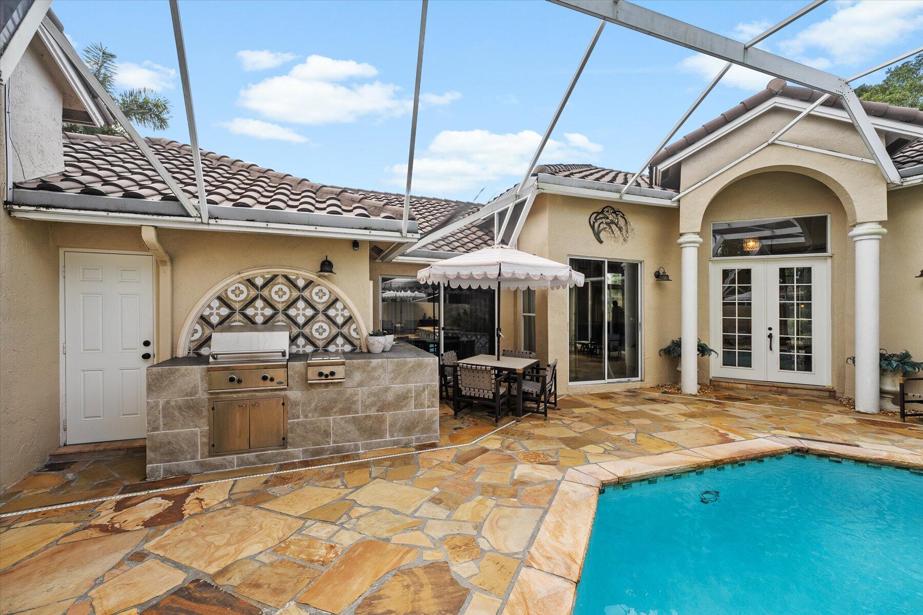 10734 Maple Chase Drive Boca Raton, FL 33498 - Photo 39 of 54 Patio/Pool Dec