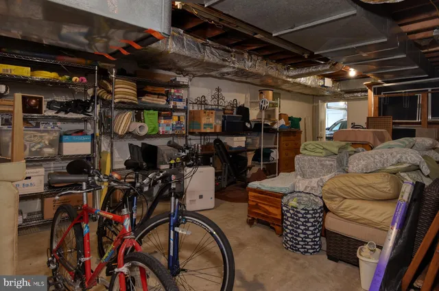a view of a storage room with furniture