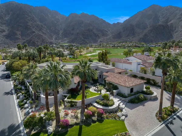 a view of a golf course with a garden