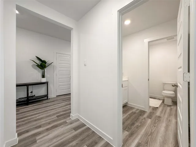 a view of a bathroom from the hallway