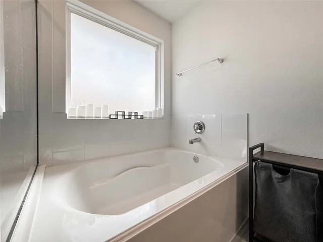 a bathroom with a bathtub