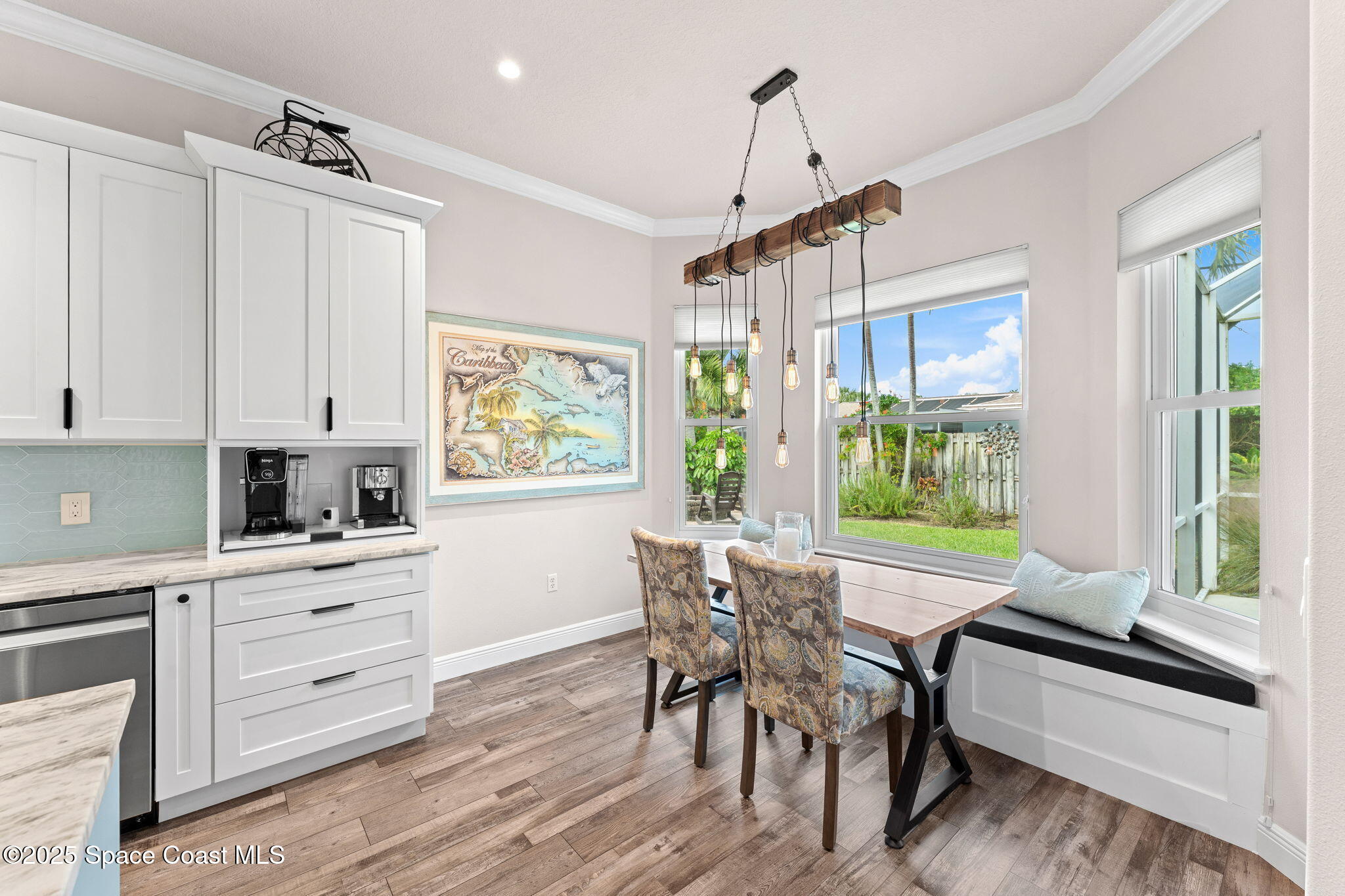 162 Miami Avenue Indialantic, FL 32903 - Photo 15 of 49 a view of a dining room with furniture window and outside view