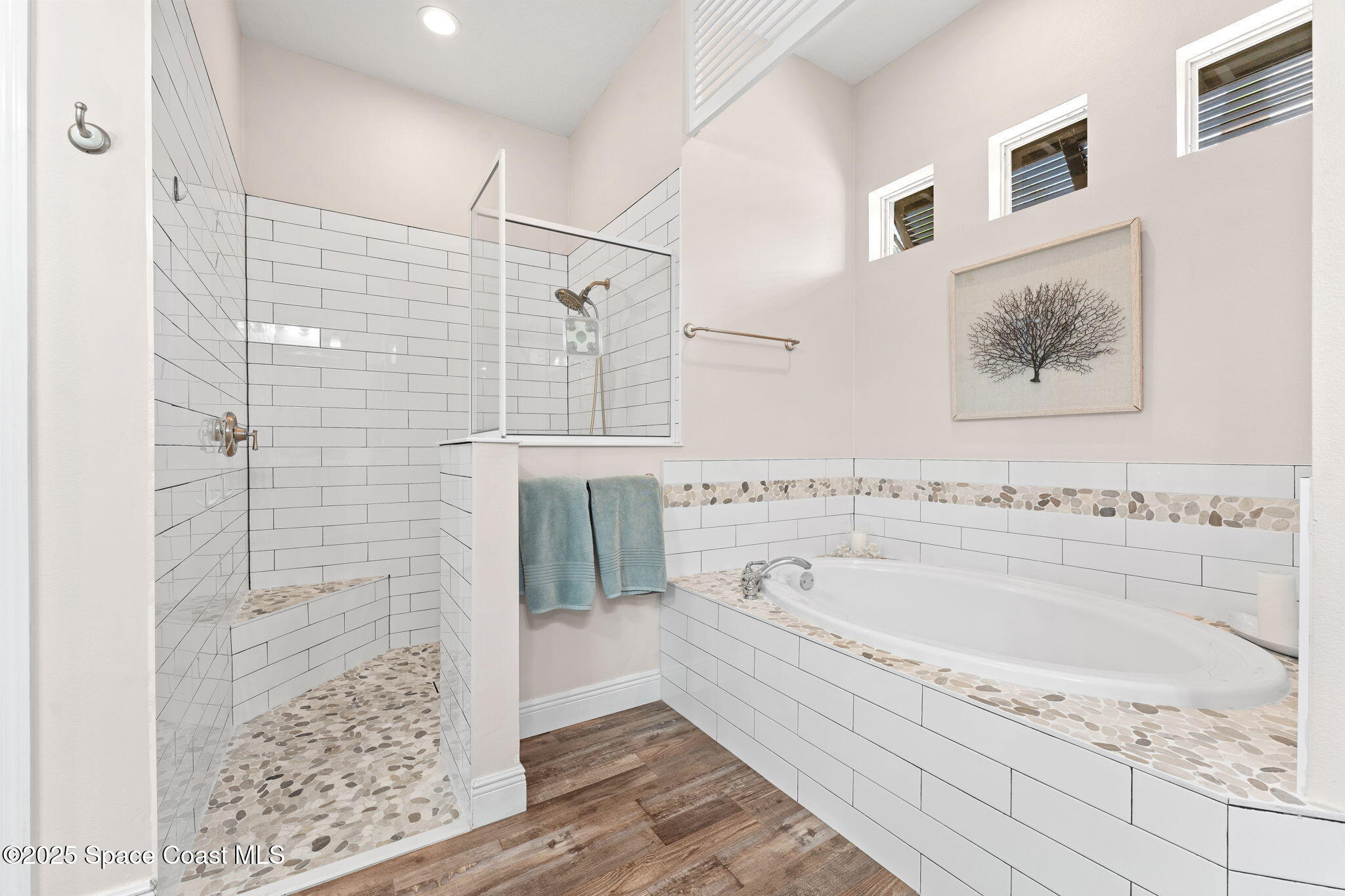 162 Miami Avenue Indialantic, FL 32903 - Photo 21 of 49 a bathroom with a bathtub and a shower