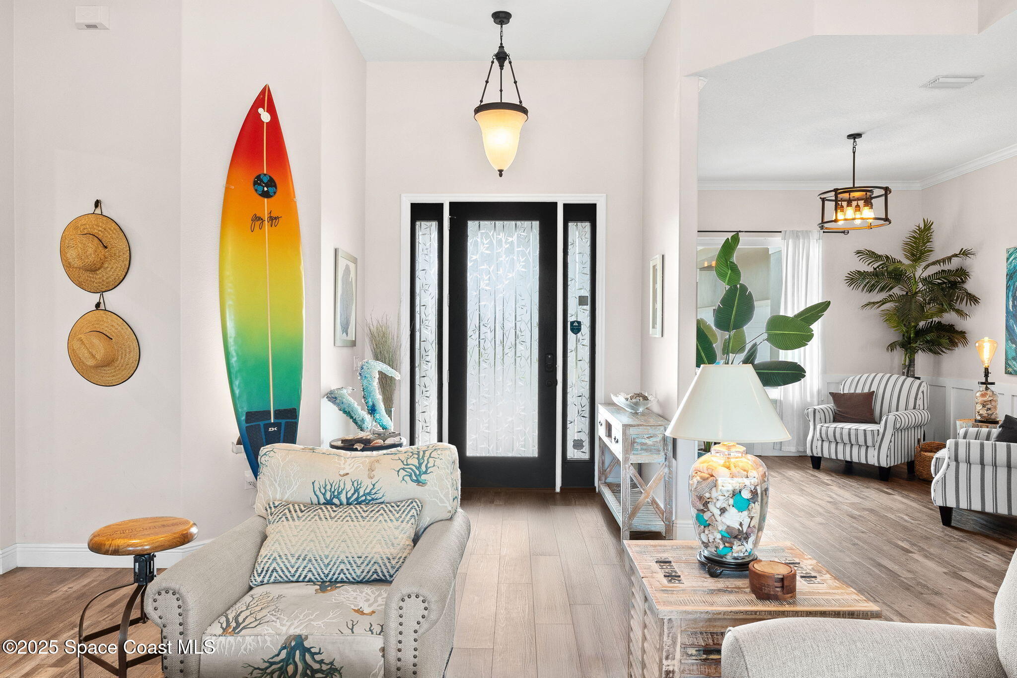 162 Miami Avenue Indialantic, FL 32903 - Photo 3 of 49 a living room with furniture and a large window