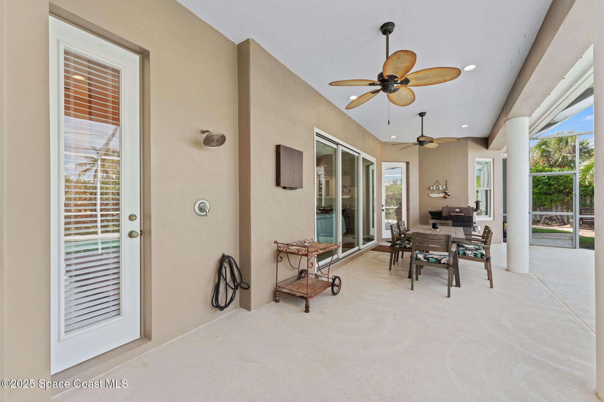 162 Miami Avenue Indialantic, FL 32903 - Photo 31 of 49 a view of a livingroom with furniture and a window