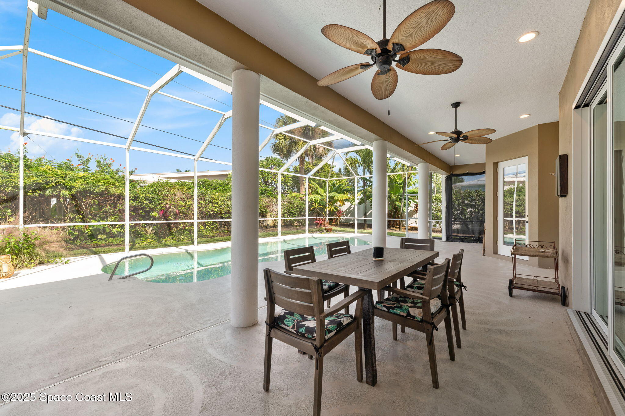 162 Miami Avenue Indialantic, FL 32903 - Photo 32 of 49 a view of a dining room with furniture window and outside view