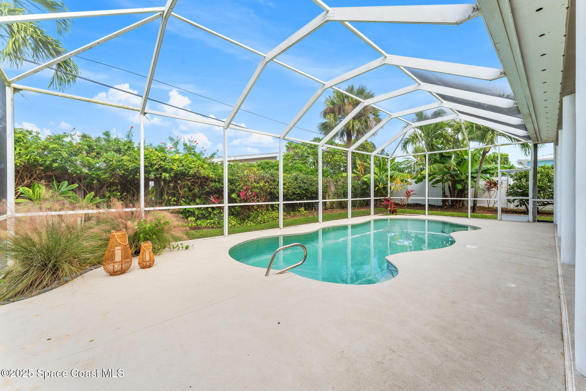 162 Miami Avenue Indialantic, FL 32903 - Photo 34 of 49 a view of a backyard with swimming pool