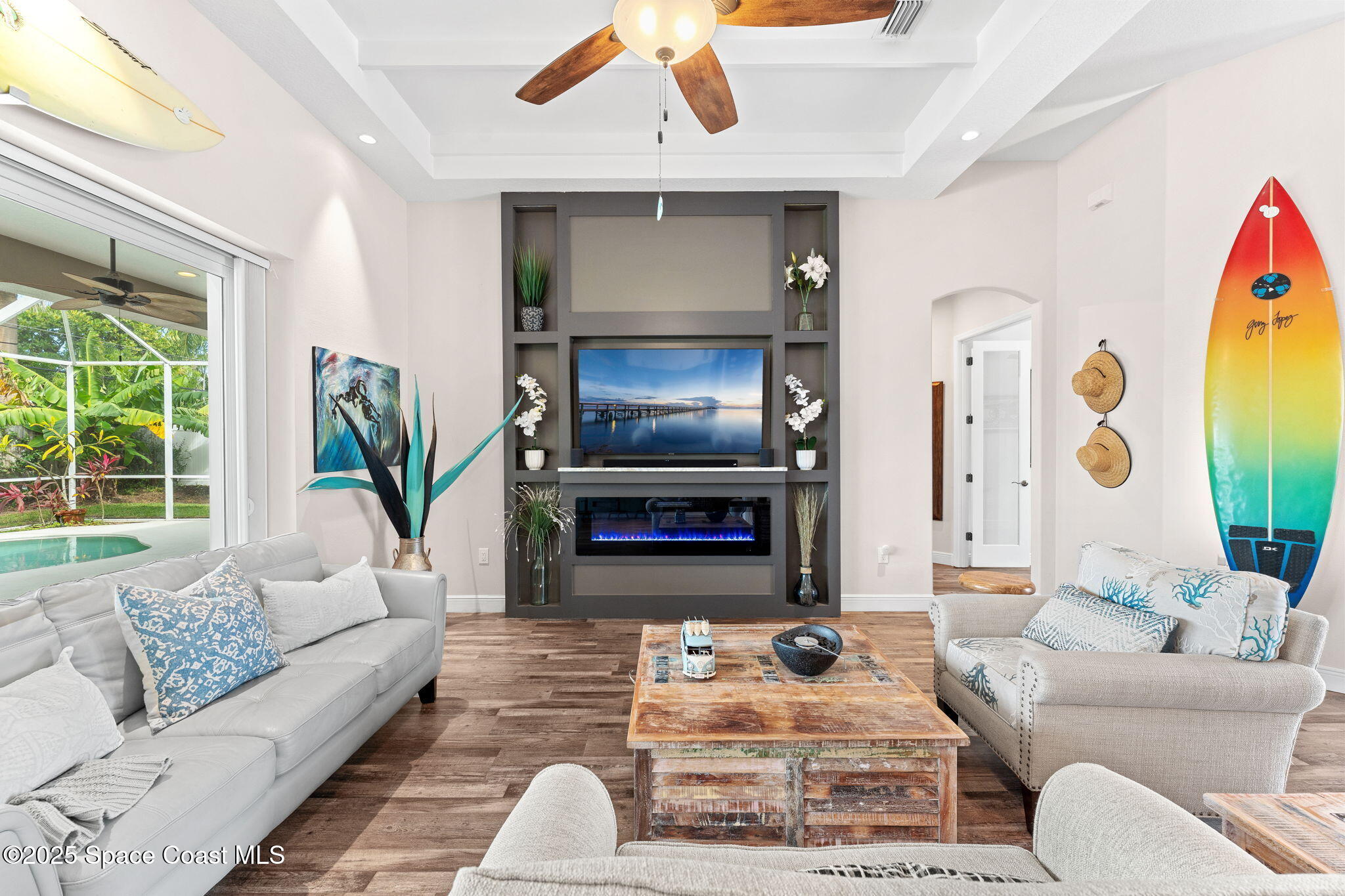 162 Miami Avenue Indialantic, FL 32903 - Photo 4 of 49 a living room with furniture and a flat screen tv