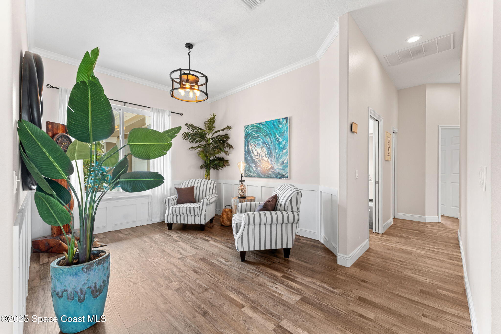 162 Miami Avenue Indialantic, FL 32903 - Photo 8 of 49 a view of livingroom with furniture and a window