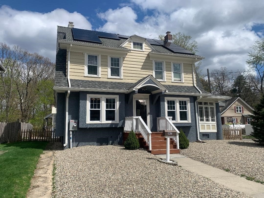 147 Belvidere Street Springfield, MA 01108 - Photo 3 of 27 a front view of a house with a yard