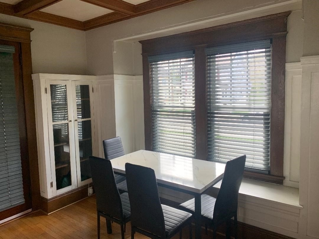 147 Belvidere Street Springfield, MA 01108 - Photo 9 of 27 a view of a dining room with furniture and windows