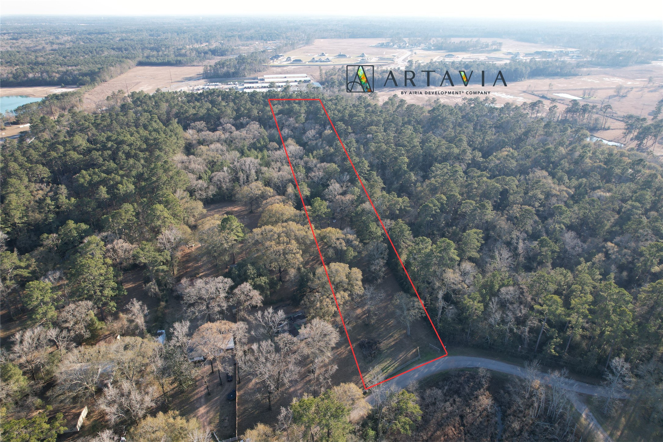 17038 Payne Road Conroe, TX 77302 - Photo 3 of 24 an aerial view of town with trees around