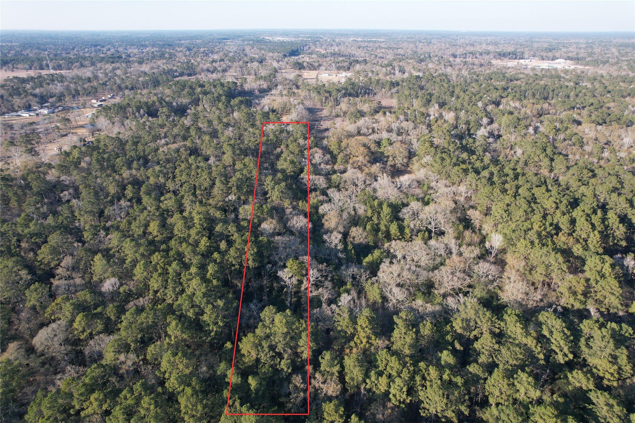 17038 Payne Road Conroe, TX 77302 - Photo 5 of 24 an aerial view of house with yard and mountain view