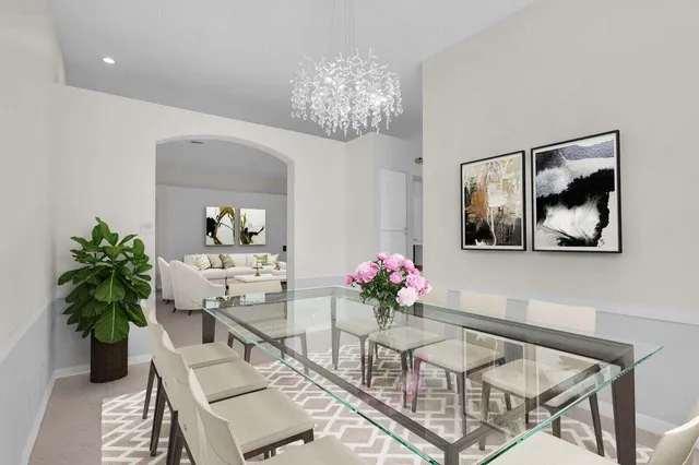 a kitchen with kitchen island a counter top space appliances and a center island