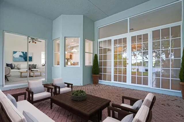 a outdoor living space with furniture and a potted plant