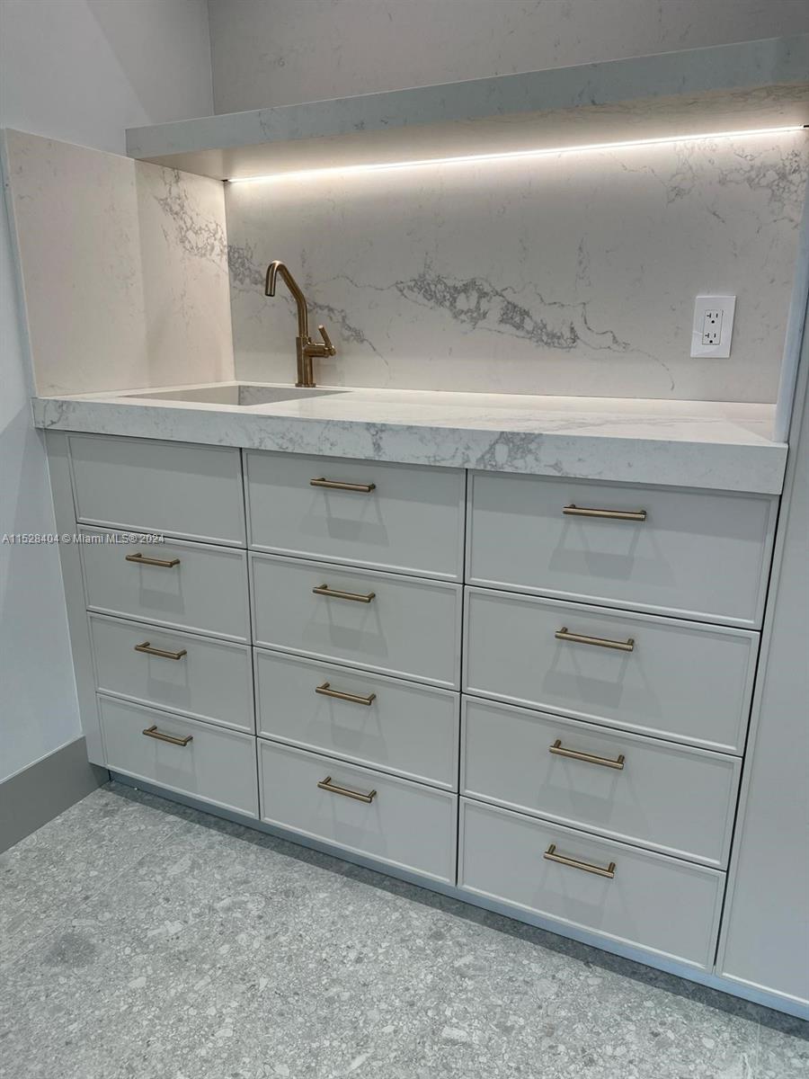 Lake Villa Key Biscayne, FL 33149 - Photo 11 of 51 a view of a dresser