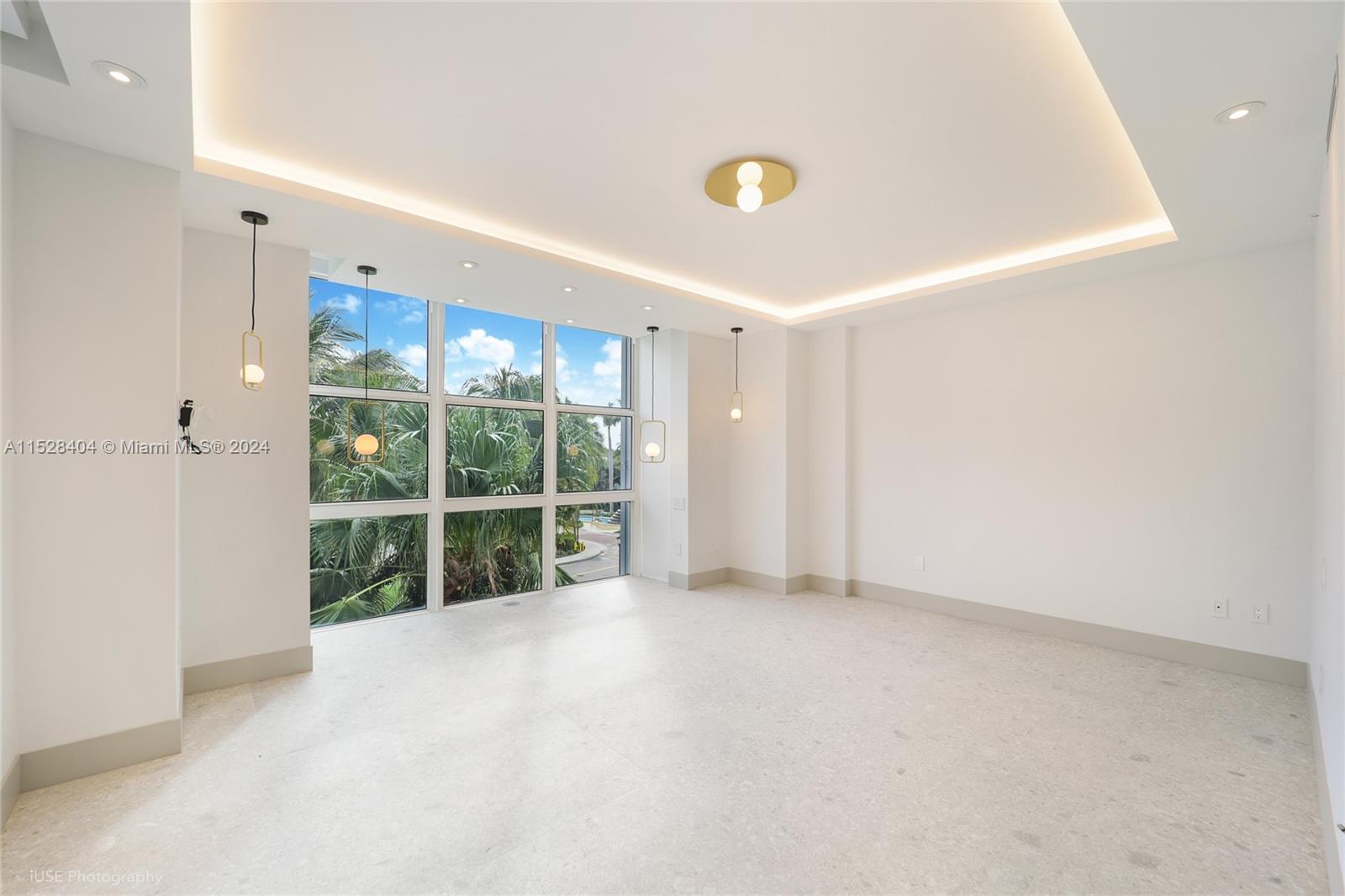 Lake Villa Key Biscayne, FL 33149 - Photo 16 of 51 a view of an empty room with a window