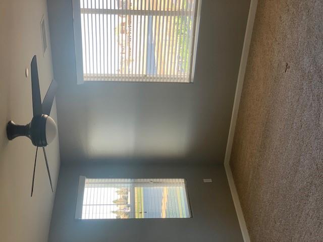 2205 Lombard Lane Clovis, CA 93619 - Photo 6 of 13 a view of an empty room with a window