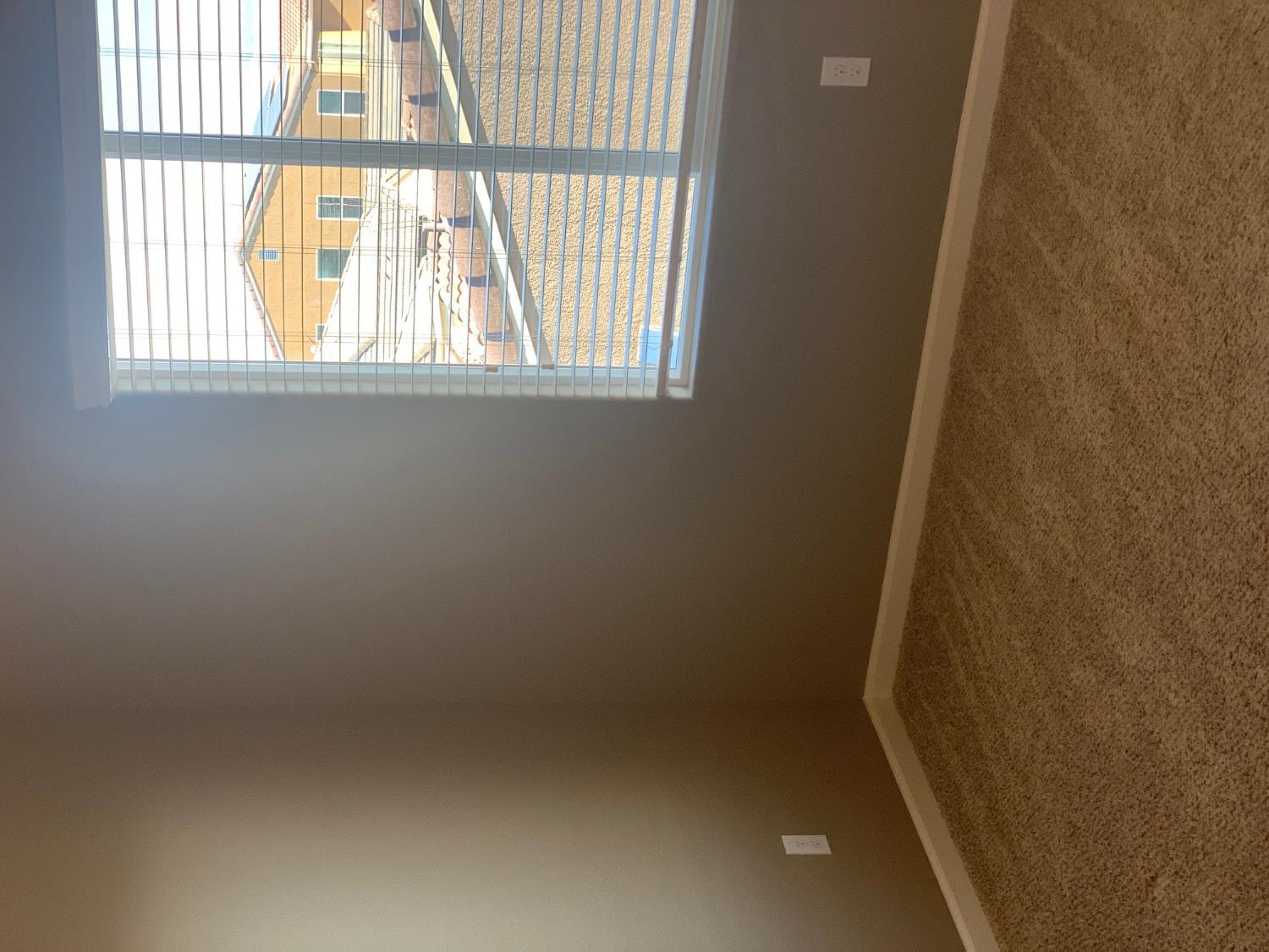 2205 Lombard Lane Clovis, CA 93619 - Photo 10 of 13 an empty room with a window