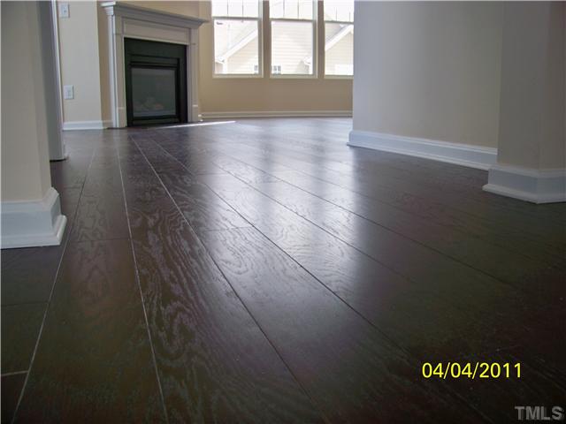 9142 Falkwood Road, Unit 171 Raleigh, NC 27617 - Photo 12 of 18 Beautiful 5" Plank Coffee Bean Hardwoods with Matching Oak Stained Staircase!